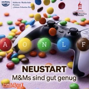 CD-Cover: Über einer Spielekonsole regnet es M&M Schokolinsen