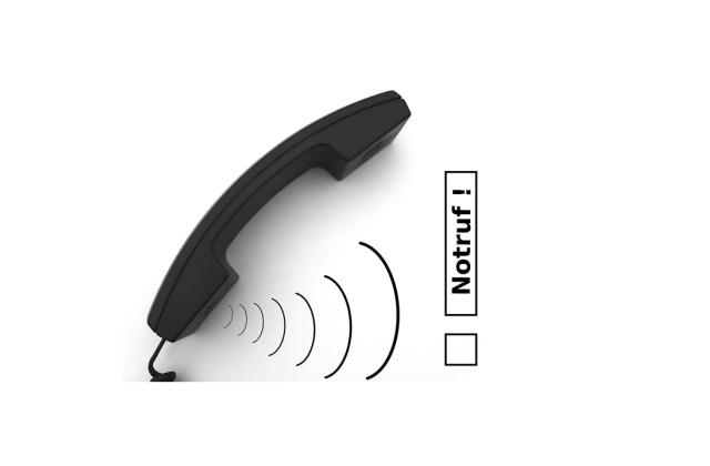 Das Bild zeigt einen Telefonhörer und den Schriftzug Notruf
